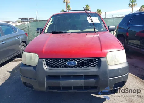 2003 Ford Escape Xls z USA, uszkodzony, nr VIN 1FMYU02193KB33177